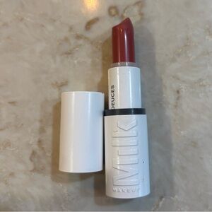 Milk Makeup lipstick in Deuces